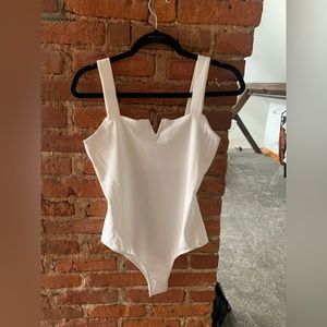 white bodysuit